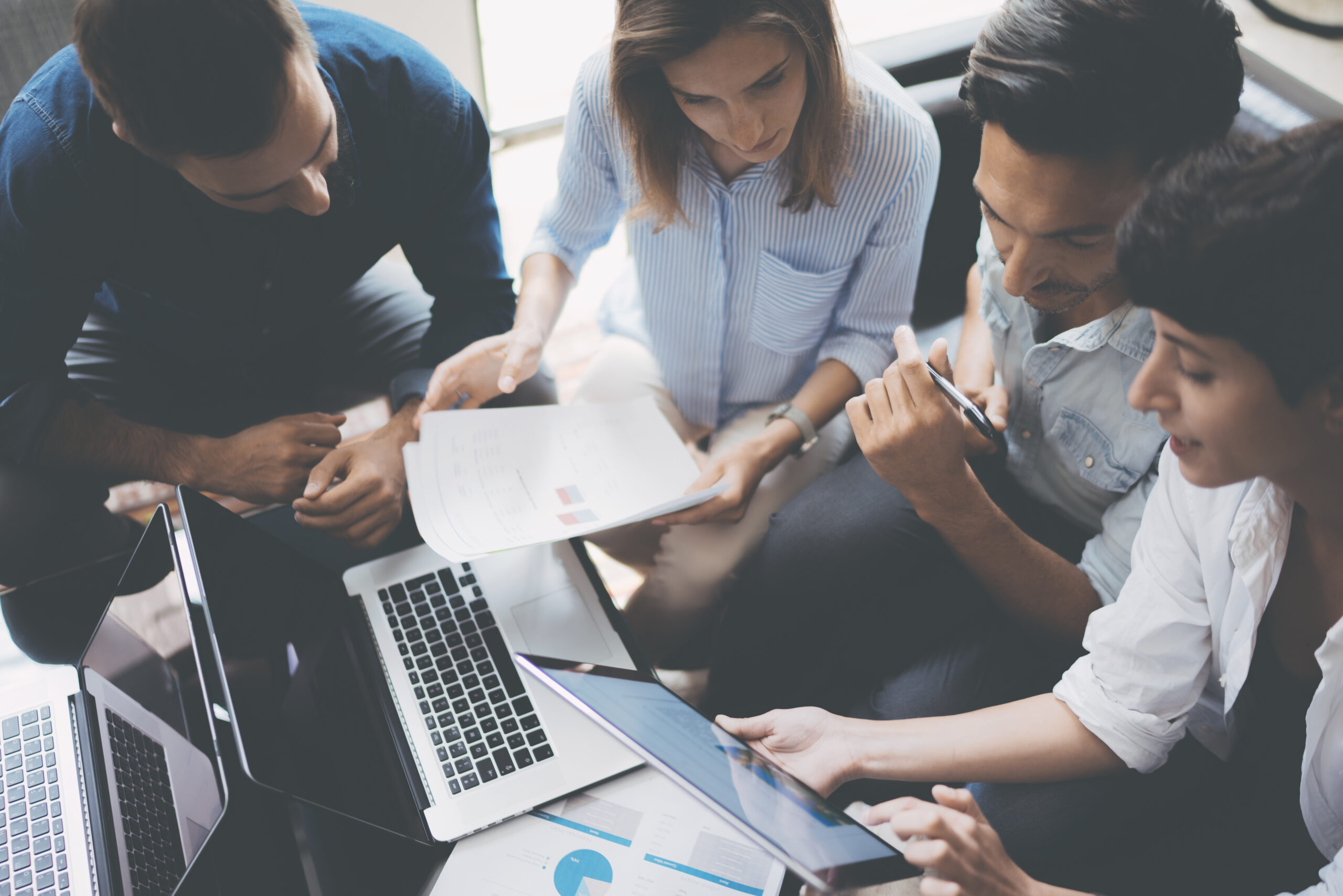 A group of professionals discussing about a project.