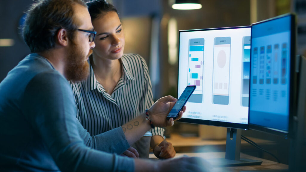 A male and female engineer testing the product functionality.