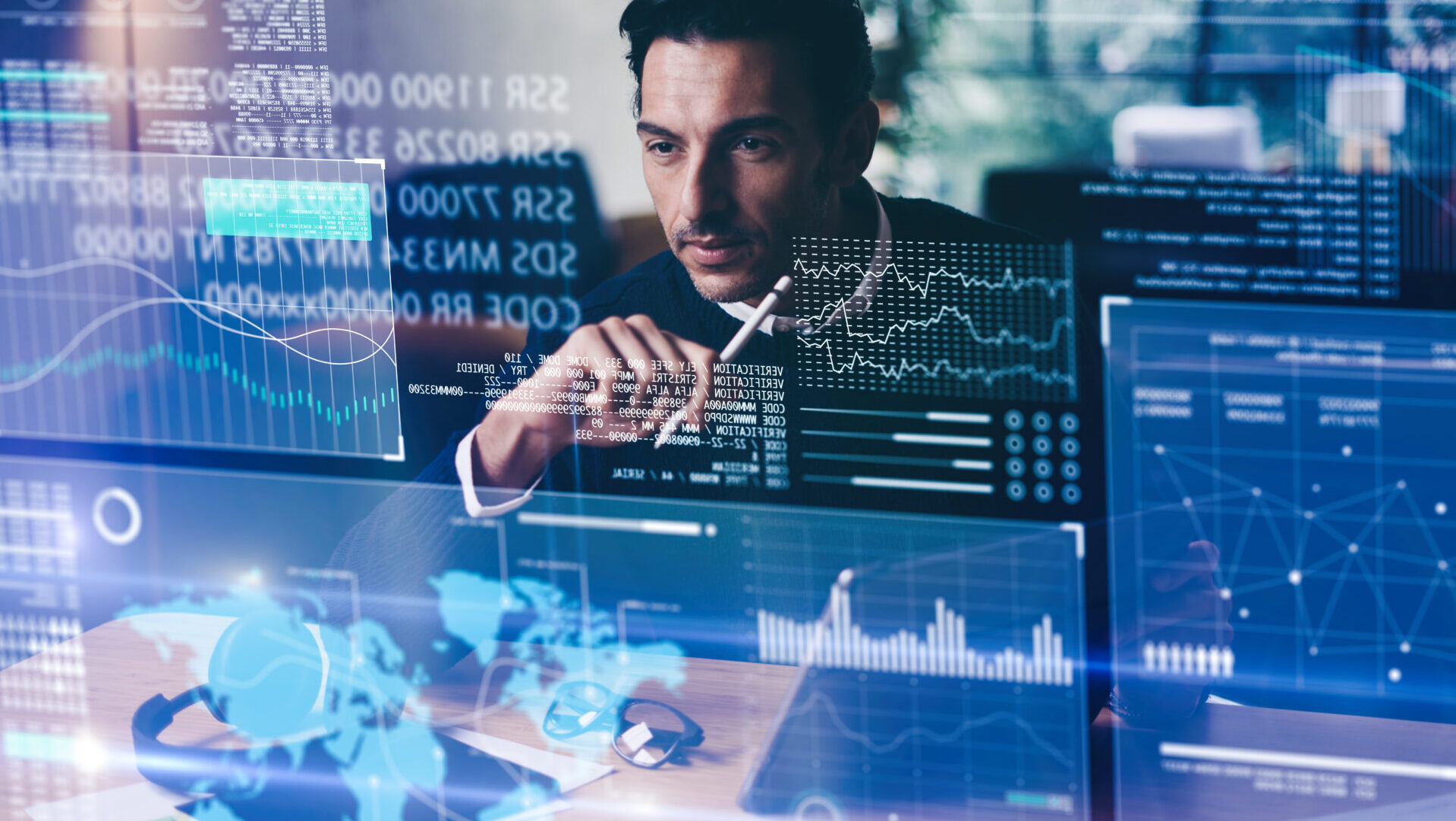 A man analyzing data from the computers.